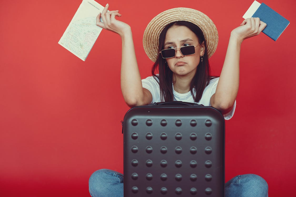 A woman holding a passport